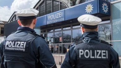 a group of police officers outside a building