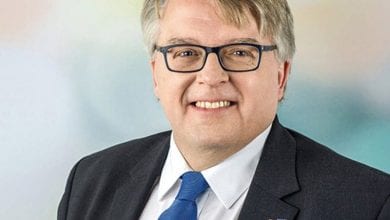 a man in a suit and tie