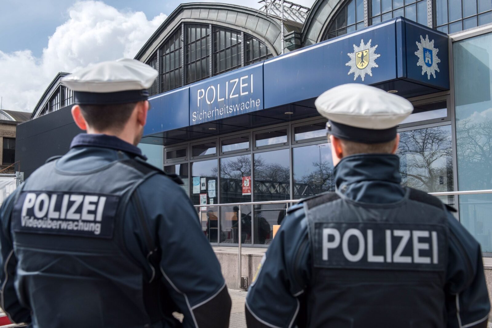 a group of police officers outside a building