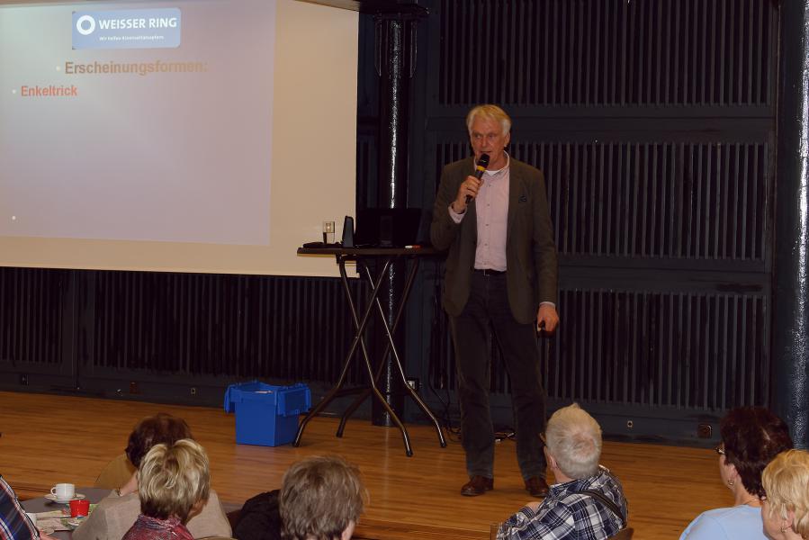a man speaking into a microphone