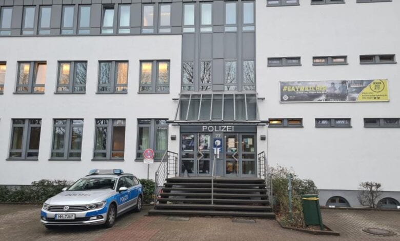 a police car parked outside of a building