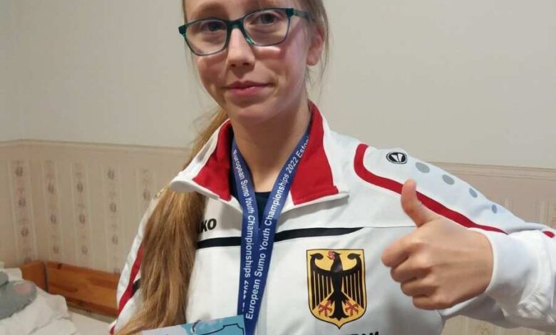 Das Bild zeigt eine Sportlerin.
