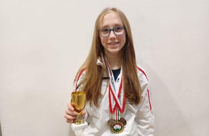Das Foto zeigt eine Sportlerin.