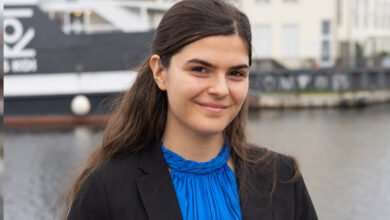 a woman smiling at camera