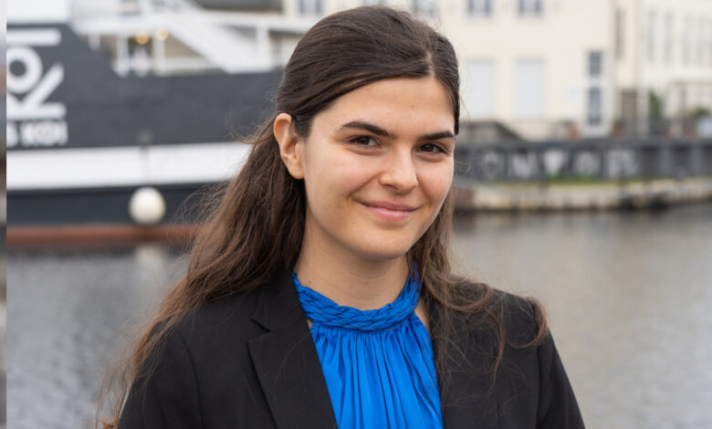 a woman smiling at camera