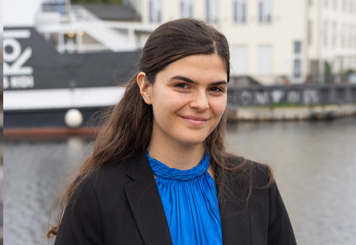 a woman smiling at camera