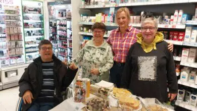 a group of people standing in a store