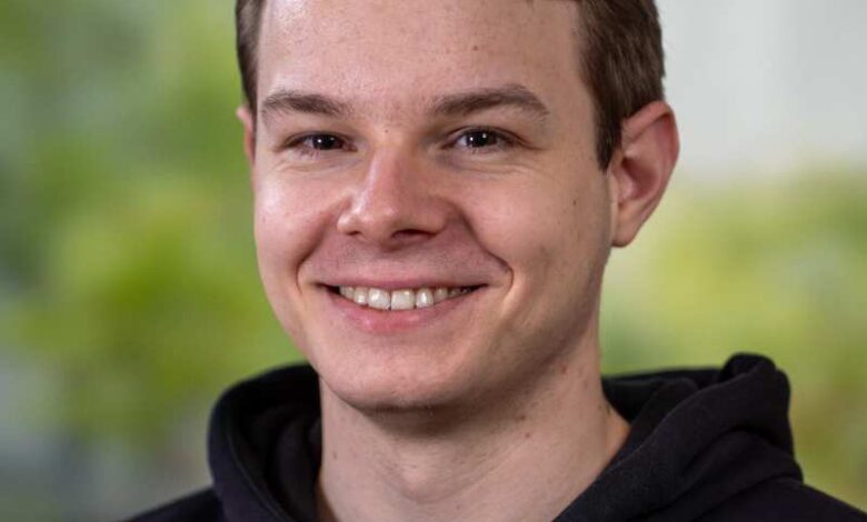 a man smiling for a picture