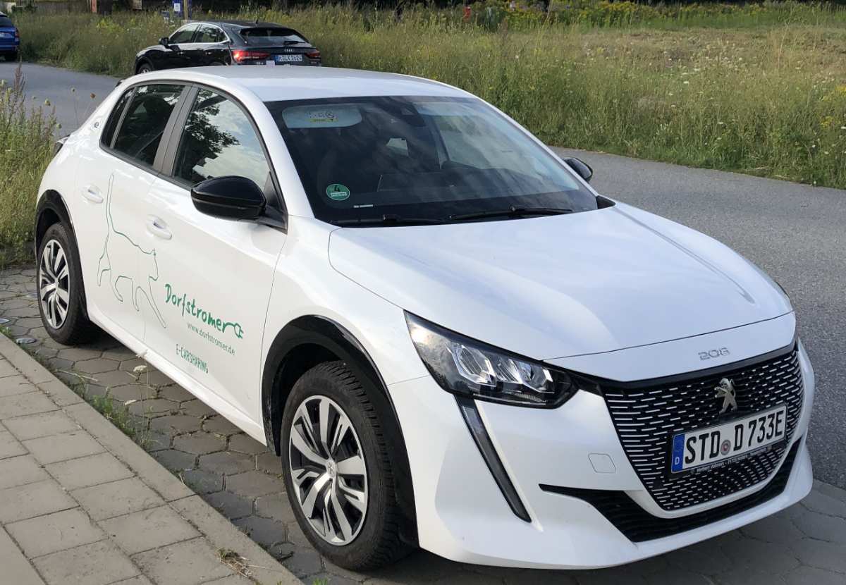 a white car parked on a road