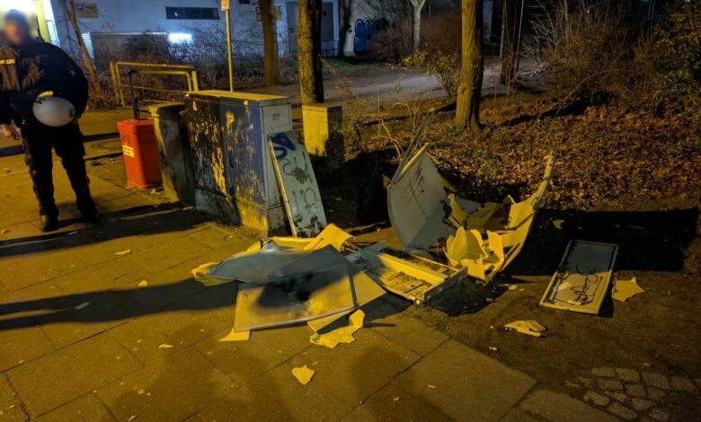 a broken metal object on the ground