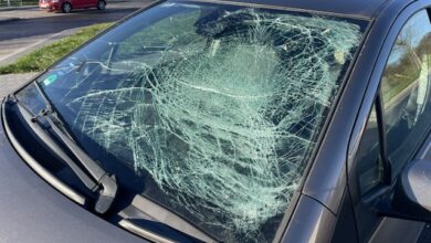 a car with a broken windshield