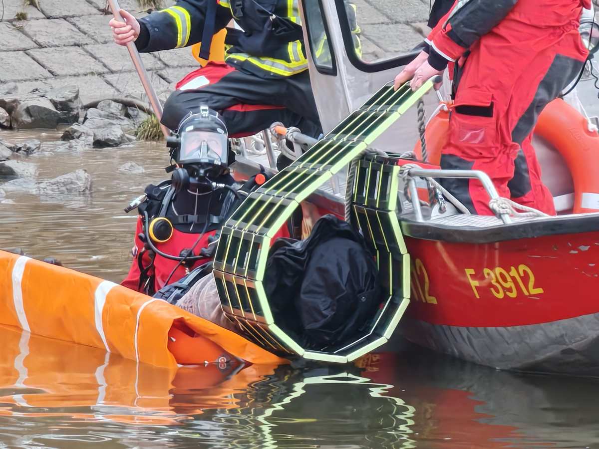a person in a scuba gear in a boat