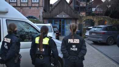 two women in police uniforms