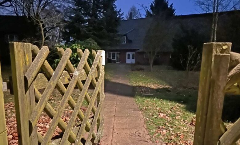 a fence and a house