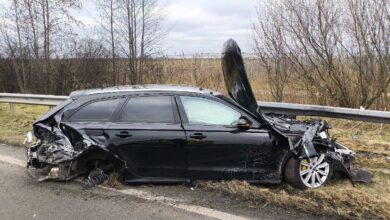 a black car with the door open