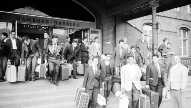 a group of people with luggage