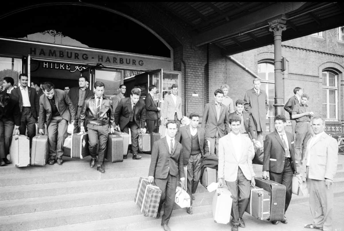 a group of people with luggage