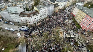 a large crowd of people in a city