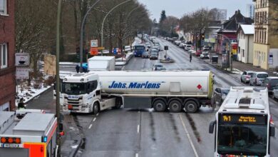 a group of trucks on a road