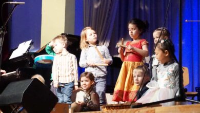 a group of children on a stage