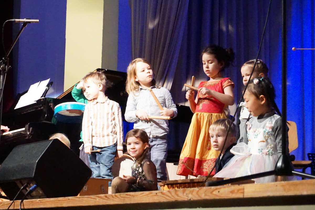 a group of children on a stage