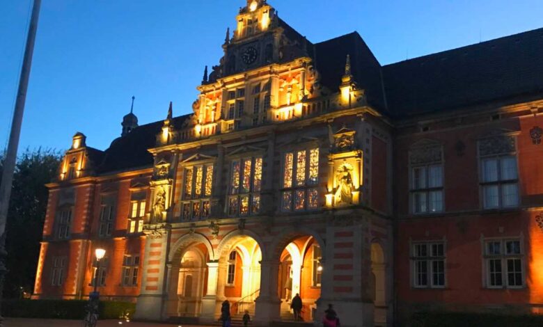 a building with lights on the front