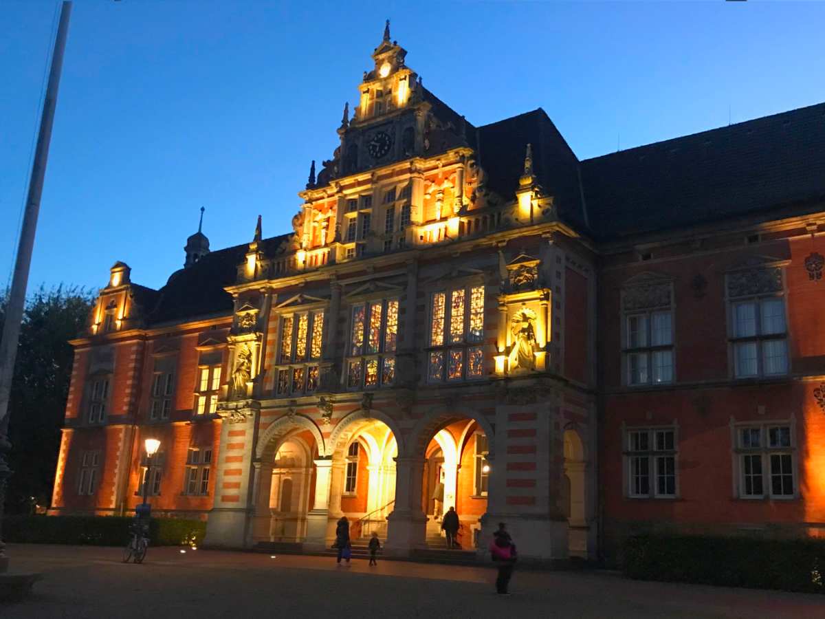 a building with lights on the front