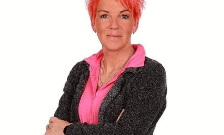 a woman with pink hair