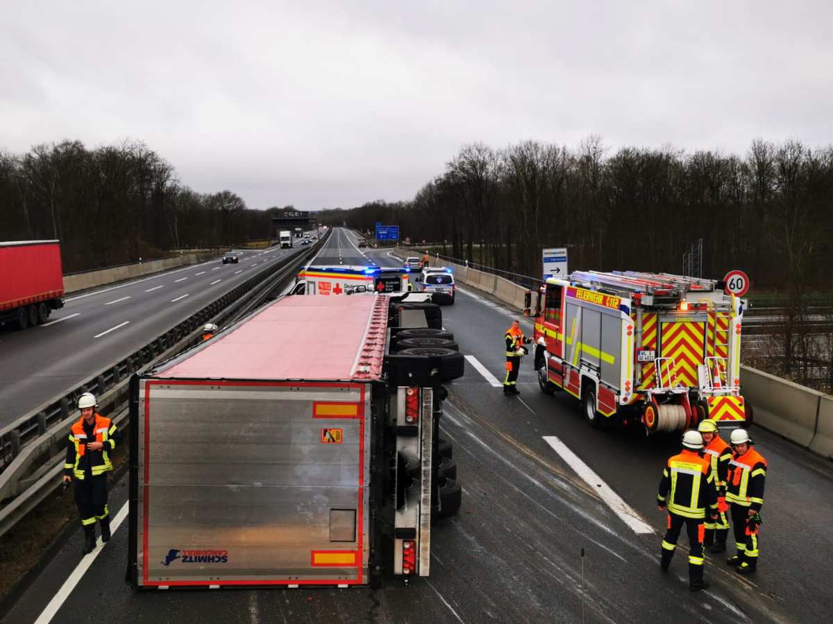 a group of emergency vehicles on a road