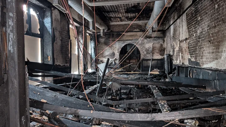 a burned room with a few windows