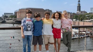 a group of kids posing for a picture