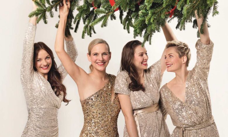 a group of women wearing sparkly dresses