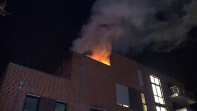 a building with a fire on top of it