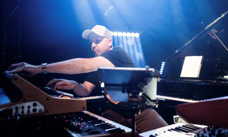 a man sitting at a piano