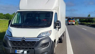 a white truck on the road