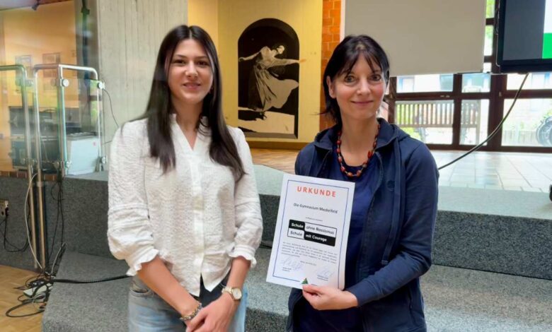 two women standing next to each other