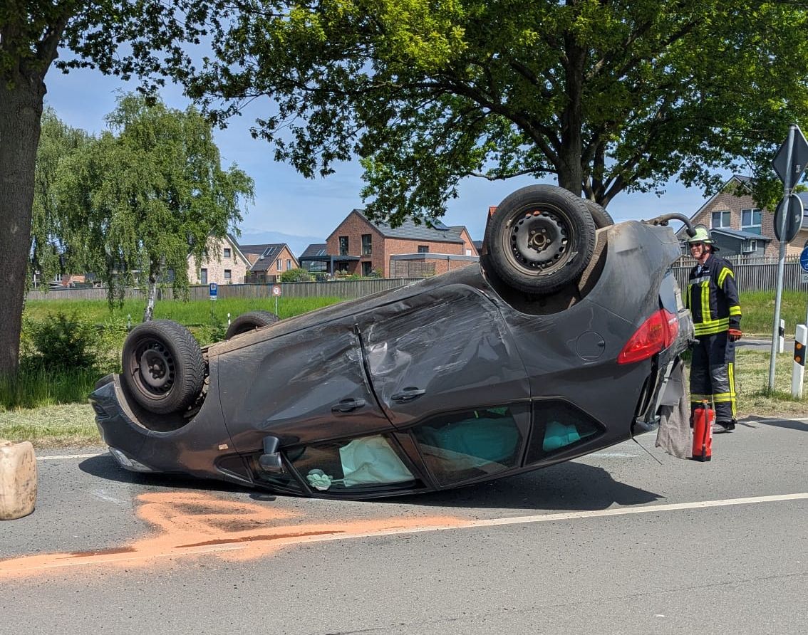 a car that has been crashed on the side of the road