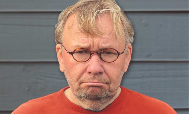 a man in a red shirt