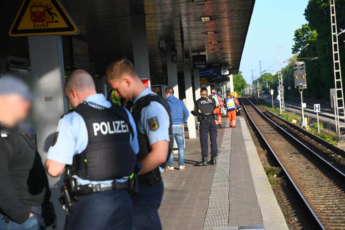 a group of police officers at a train station