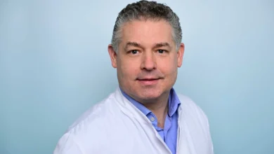 a man in a white coat