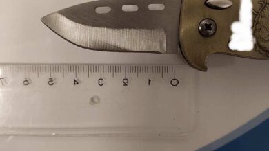 a knife with a ruler