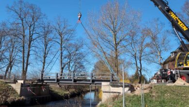 a bridge with a crane attached to it