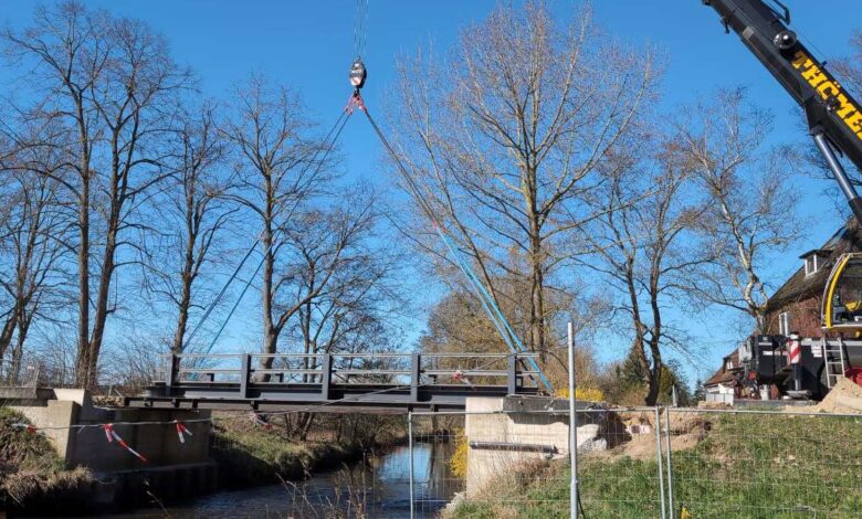 a bridge with a crane attached to it
