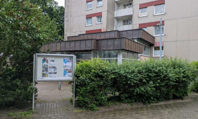 a sign in front of a building