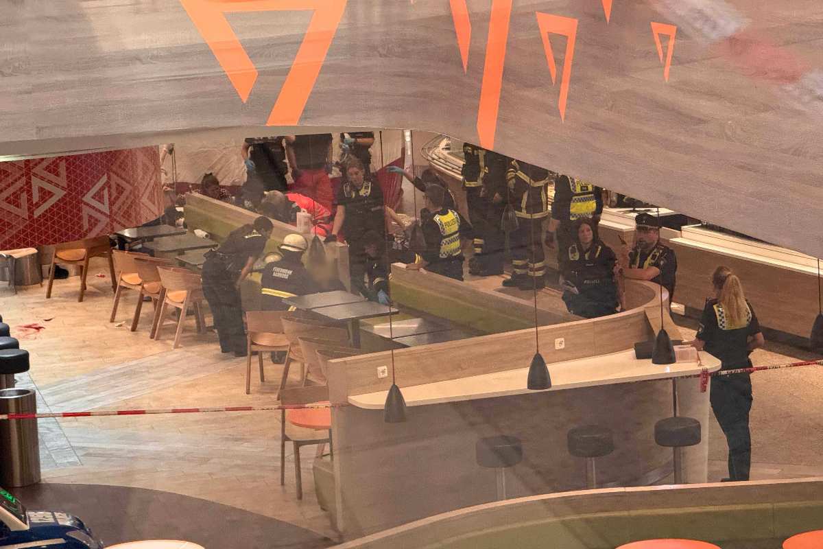 a group of people in a restaurant