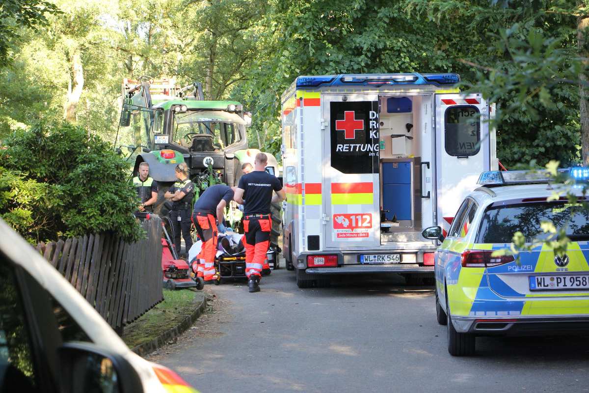 a group of people in uniform and a ambulance