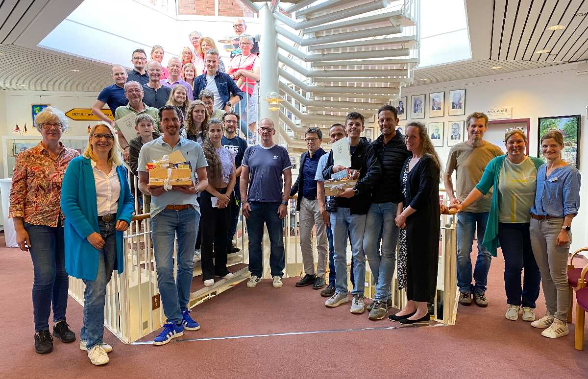 a group of people standing on a staircase