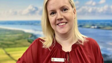 a woman in a red shirt