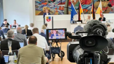 a camera with a man on a screen