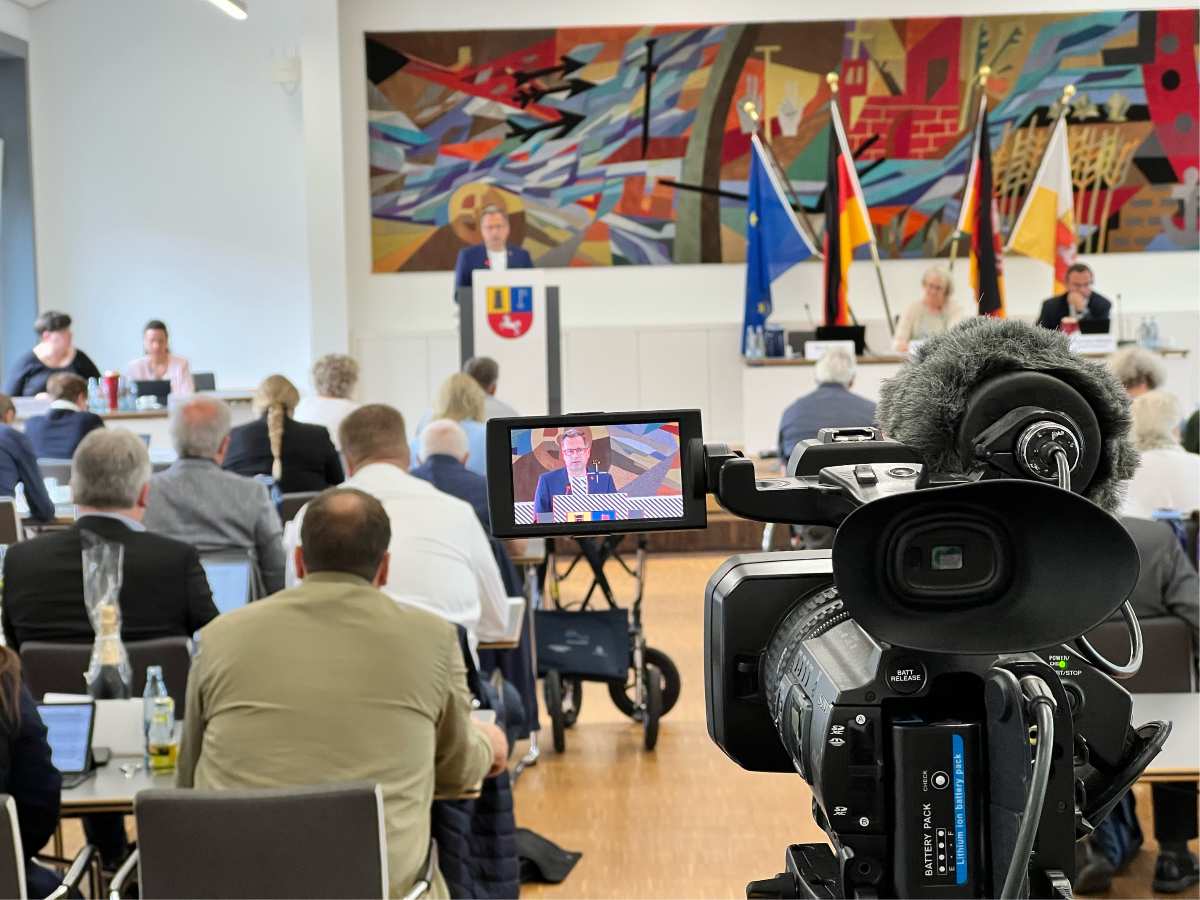 a camera with a man on a screen